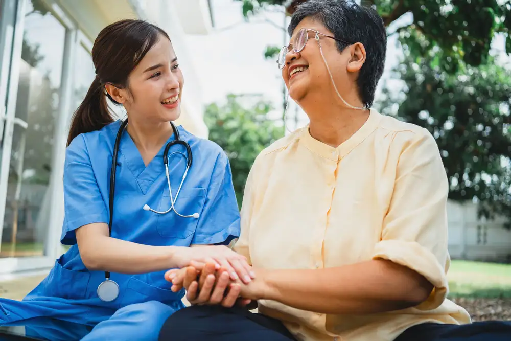 Home health nurse assisting senior with daily care in Flower Mound TX