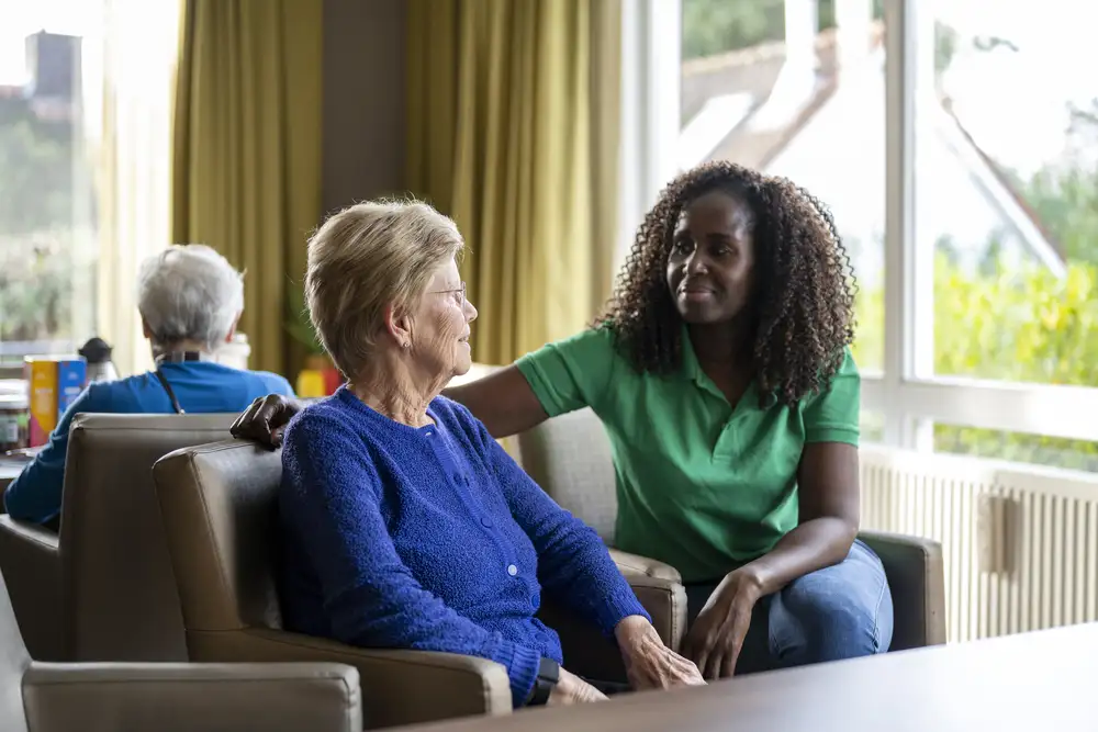 Caregiver taking a break while respite care provider supports patient in Flower Mound TX